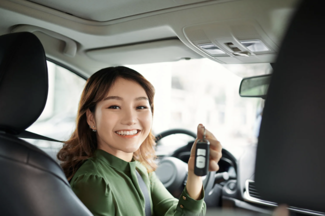 young woman who just a bought a used car in sarasota